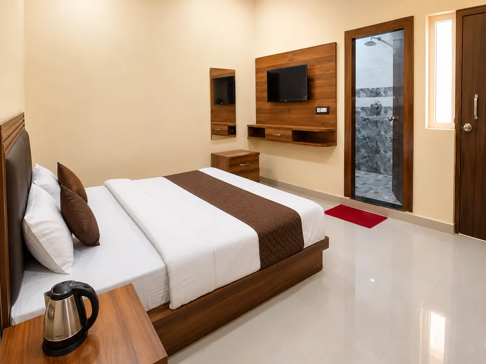 Balcony room with double bed and attached bathroom